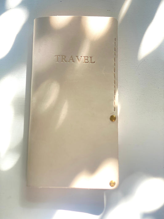 Large Travel Wallet  Chaio - with the word Travel embossed on the cover.
